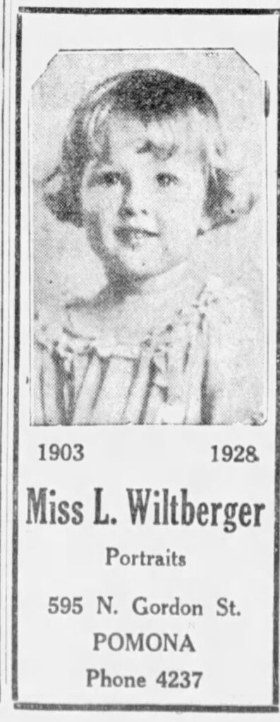 Cute ad with kig photo, for Miss L. Wiltberger's studio, Ad for the Little White House Studio that celebrates 26 years in busineas. The Progress Bulletin, December 31 1927