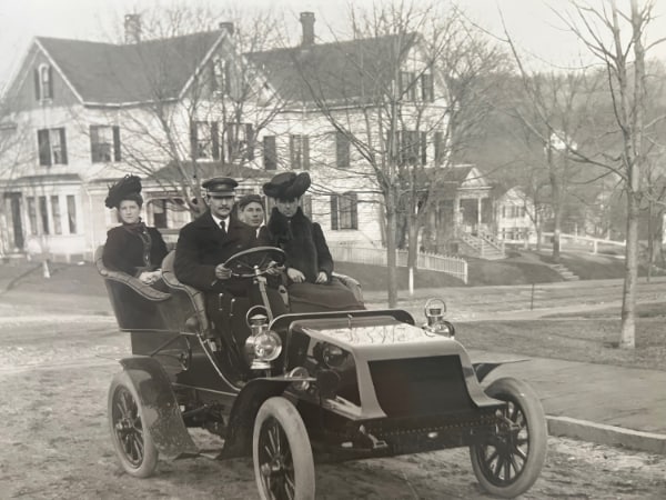 Photo by Clara Barton Drew of people in a motor car in Ansonia.