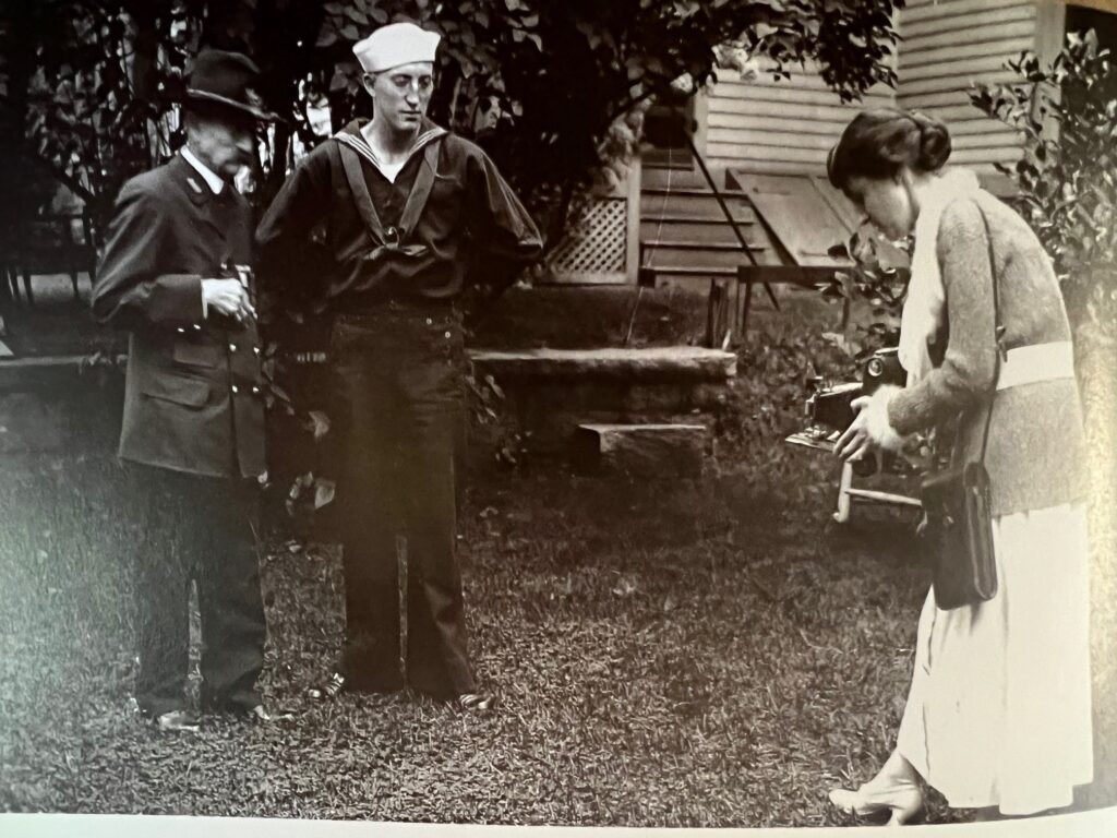 Woman photographer (Clara B. Drew?) taking photo of sailor and Civil War Veteran, June 1919.  Photo from the Drew Studio  (Courtesy of the Derby Historical Society)