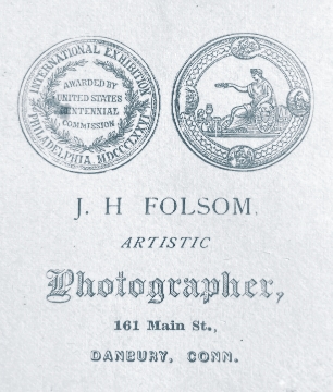Back of photo of man with moustache and bow tie. CDV by J. H. Folsom.