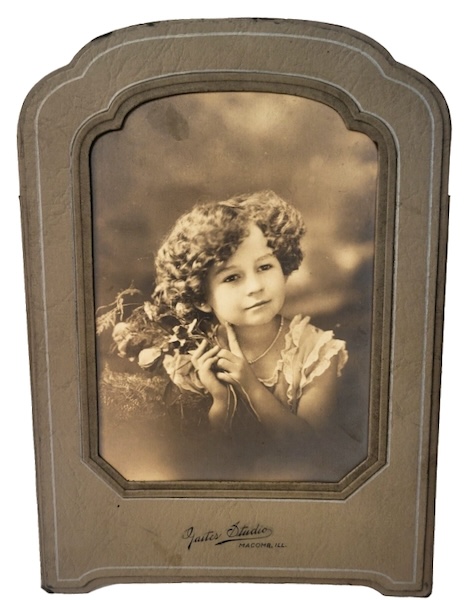 Portrait of a little girl with hair in ringlets  taken at the Gaites Studio in Macomb, Illinois. (Courtesy McIntyre-Culy collection)