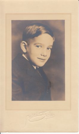 photo of a young boy in a suit, Photo by Mabel Sykes (McIntyre-Culy Collection)