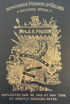 Back of Cabinet Card photo by Mrs. J. H. Folsom's studio in Danbury, CT
